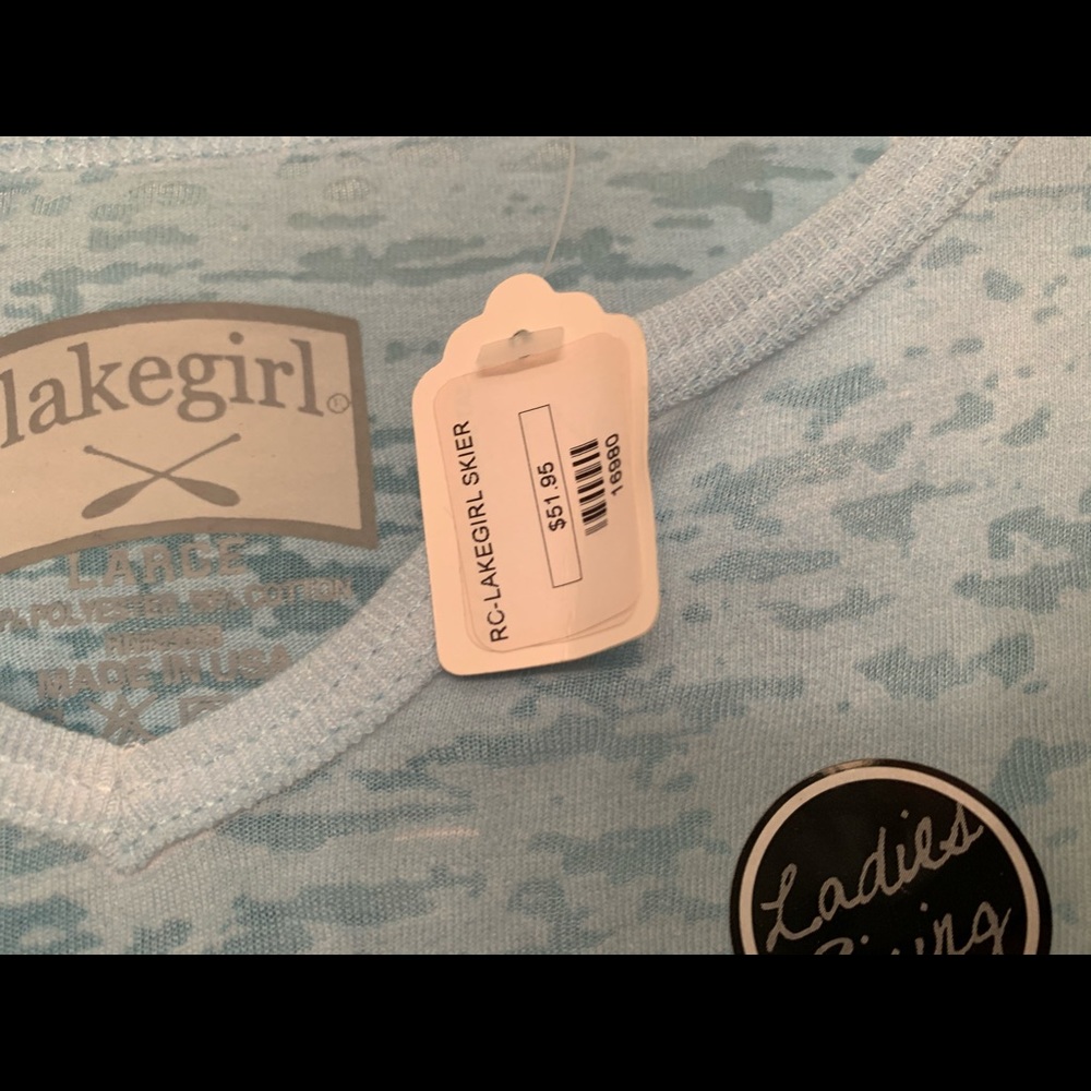 See through swimsuit cover up top or cute shirt.